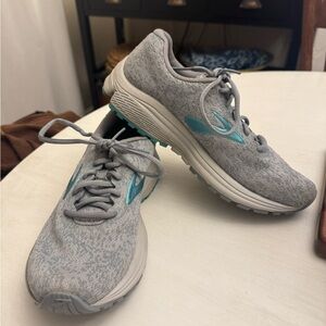 Gray and Teal Brooks Running Shoes